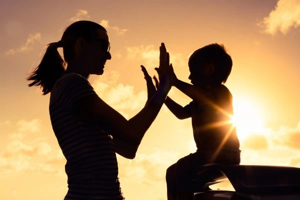 Image of happy mother and child after resolving child arrangements Gwynedd